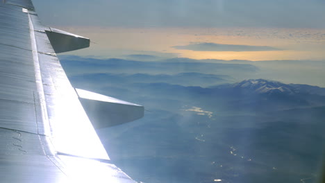 Landscape-scene-view-from-flying-airplane