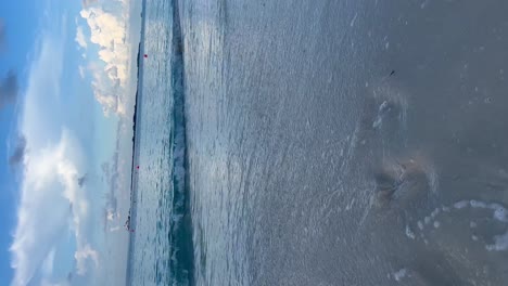 The-waves-of-the-sea-erasing-the-prints-of-the-feet-marked-in-the-sand