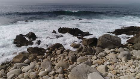 Waves-Crashing-Against-Sea-Rocks