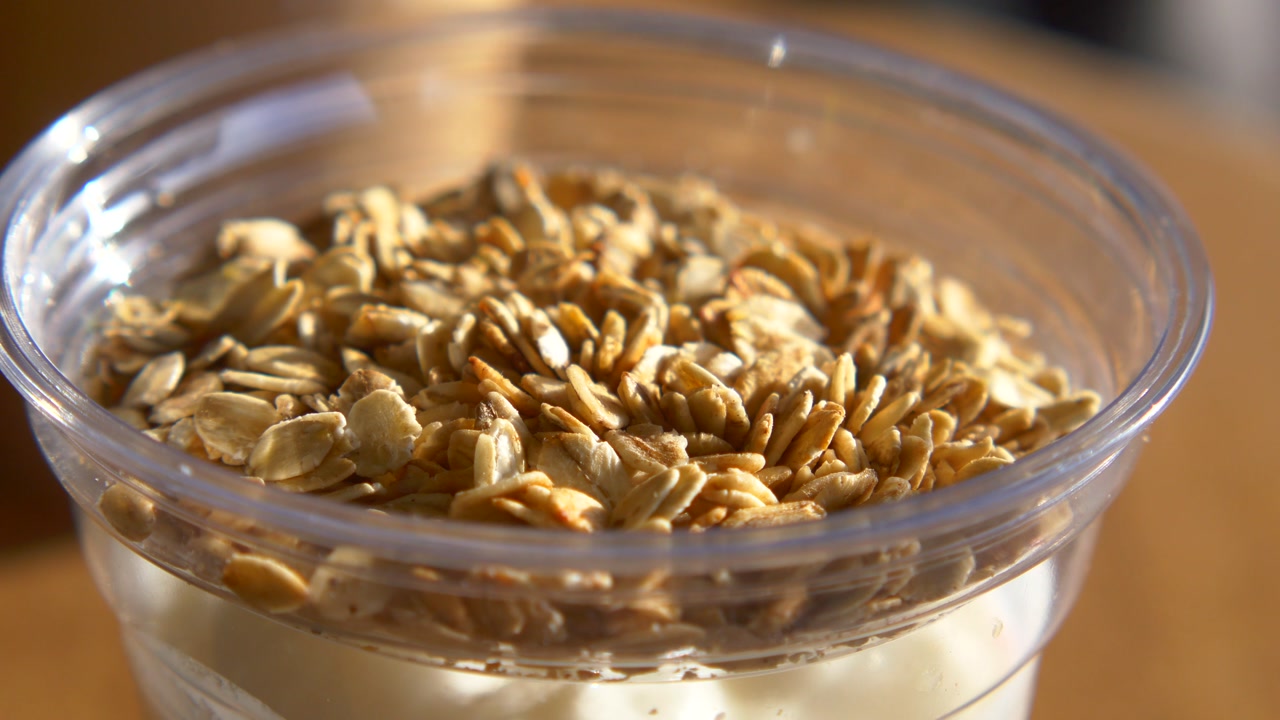 Healthy Breakfast with Granola and Yogurt in a Clear Cup