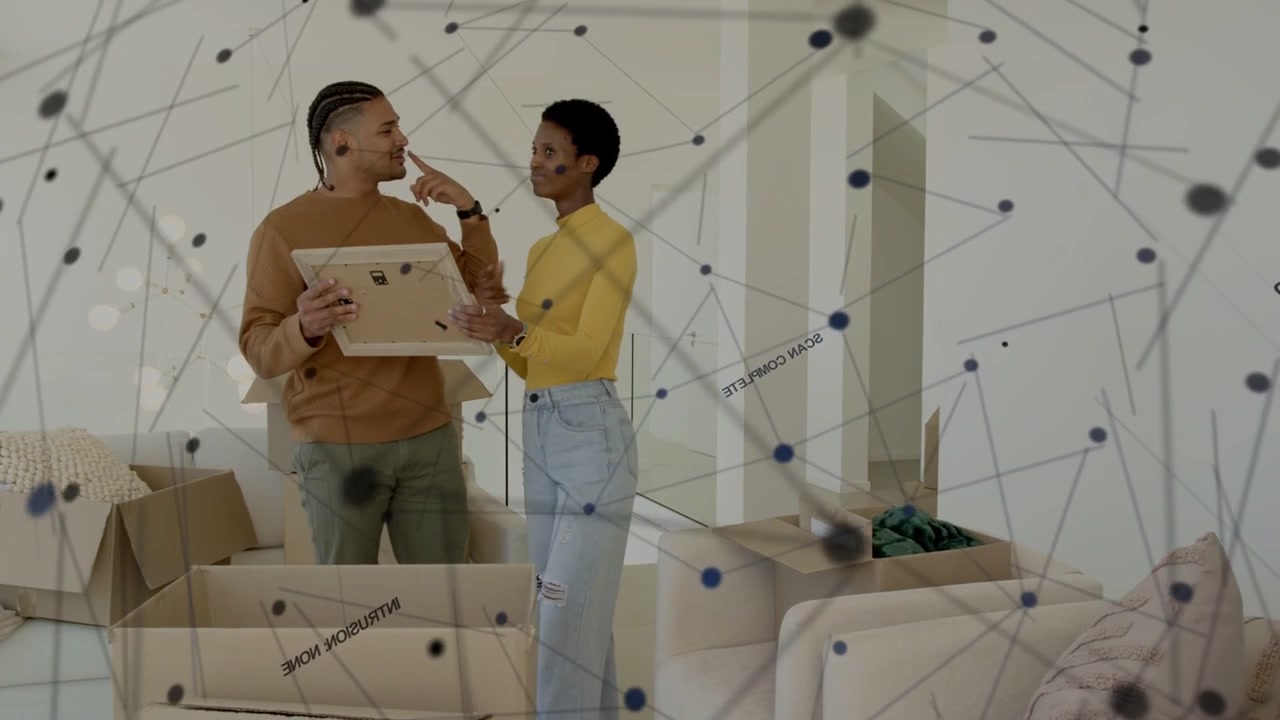 Uomo che indica una posizione e donna che lo imita, mentre decidono il posizionamento per una configurazione di rete domestica, con un'interfaccia grafica che marca le pareti