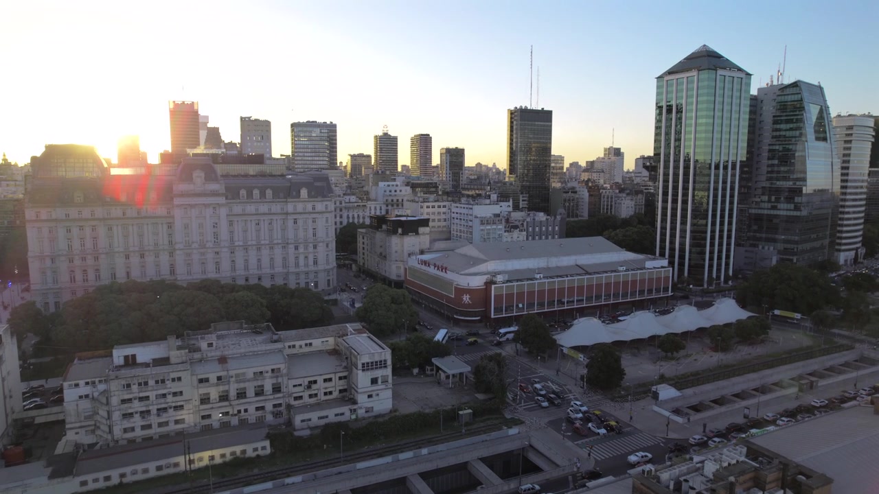 4K drone aerial view of Puerto Madero and Luna Park in Buenos Aires, Argentina. Iconic waterfront, modern skyline and one of the city’s most historic entertainment venues.