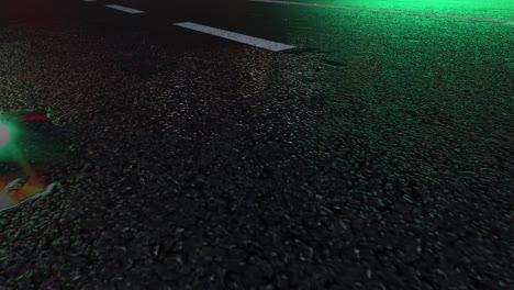 3d heavy rain hitting road at night - 4k realistic rain particle (loopable) - rainy day on a colorful street with traffic - wet road at night - low angle shot of in the rain - rainfall and reflection on road - loopable moving image - traffic lamp