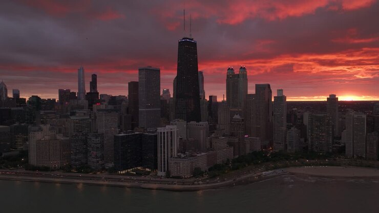 Imagens aéreas panorâmicas do pôr do sol colorido de Chicago