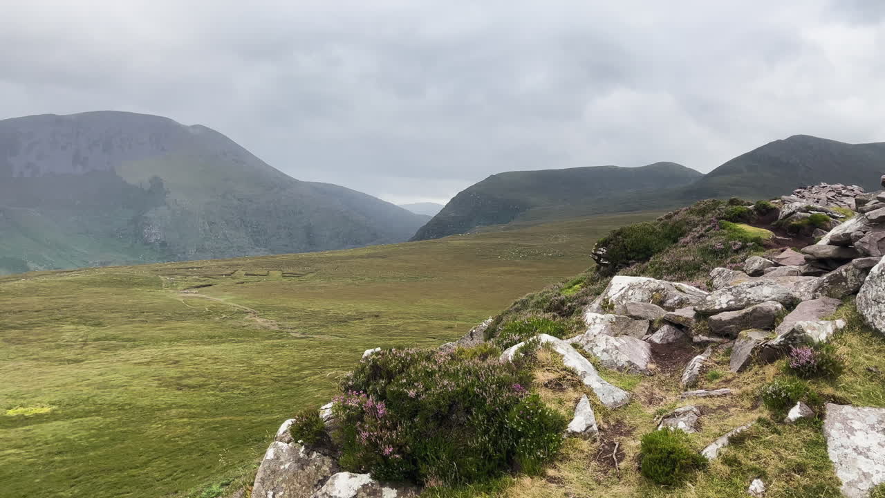 Stunning landscape of piles of stones in the Conor Pass in Ireland.