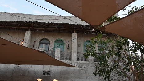 an old traditional emirati house at al seef dubai is a place of old traditional emirati architectural buildings, houses, shops, united arab emirates