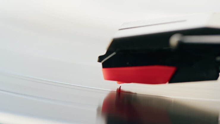 Close-up of Turntable Needle Playing Vinyl Record