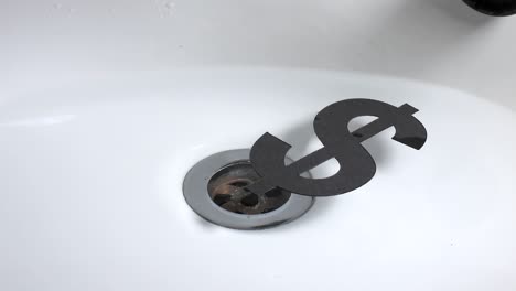 currency down the plughole