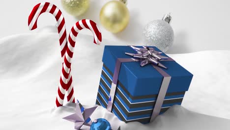 animación de regalo de navidad y icono de caña de caramelo en la nieve contra la decoración de la joya de navidad.