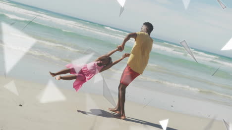 father spinning daughter on beach with geometric shapes animation over scene