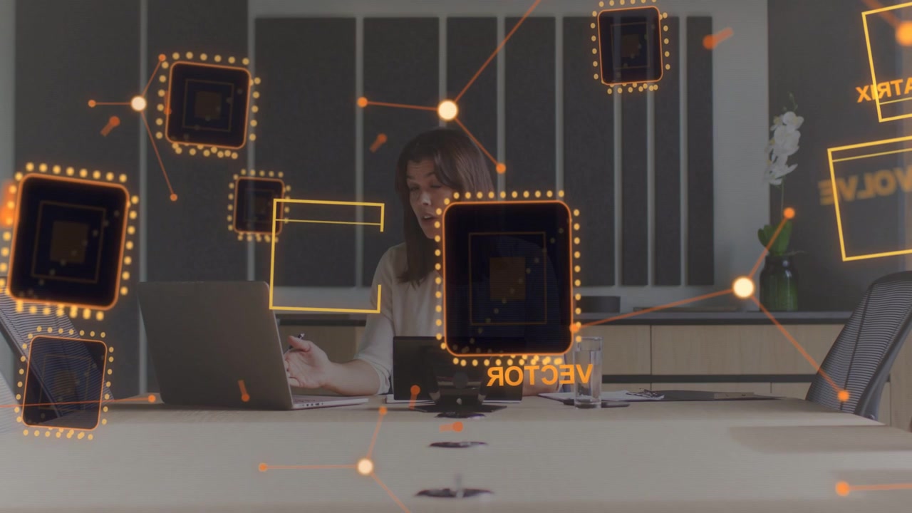 Woman typing on laptop starting glowing chip icons crossing table and obscuring face for tech demo