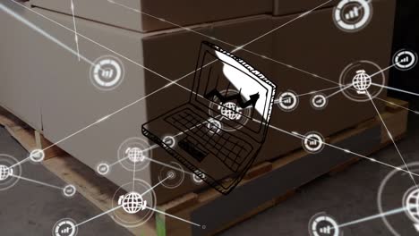 Animation-of-laptop-illustration,-connected-icons-over-cardboard-boxes-on-wooden-pallet-in-warehouse