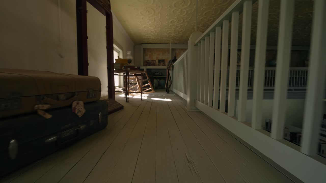 Old dusty attic pull away revealing antiques, knick knacks, and old collectible treasures with hard sunlight 4k