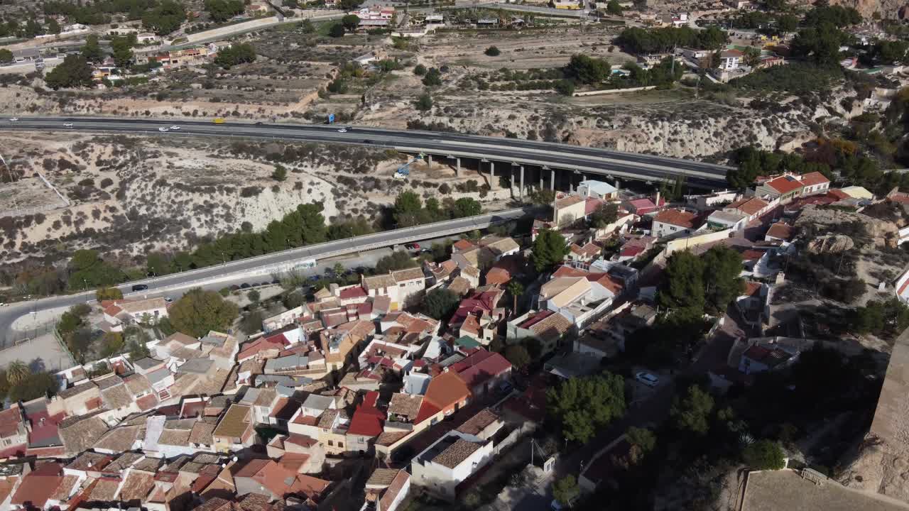 Aerial approach to the arab castle and old town of Petrer, Spain
