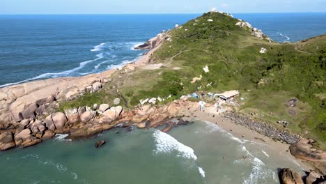 aerial drone view of deserted beach with many rocks and stones tropical paradise in gravatá beach