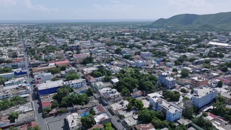 aerial above city of bani, capital town of peravia province in dominican republic