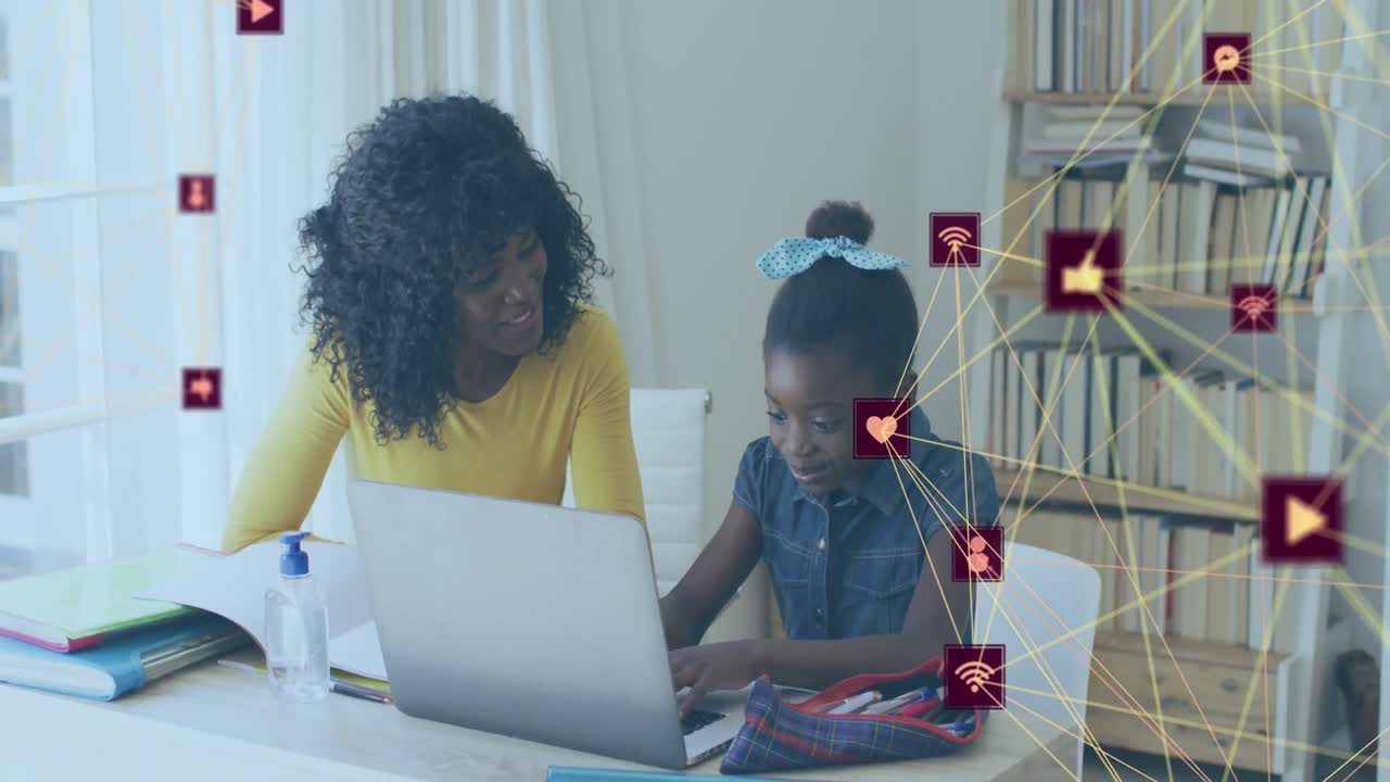 Animation of globe of digital icons over african american mother helping her daughter with homework