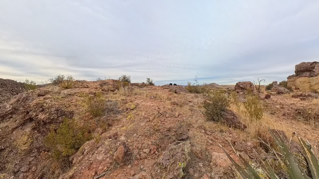 Cloud Time Lapse of hiker enjoying the view in the Superstition Mountains