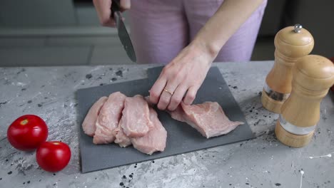 preparing raw chicken breast