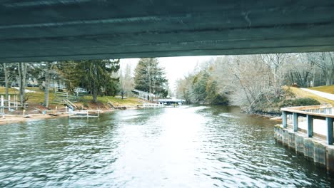 westward fly under of old stone and cement bridge