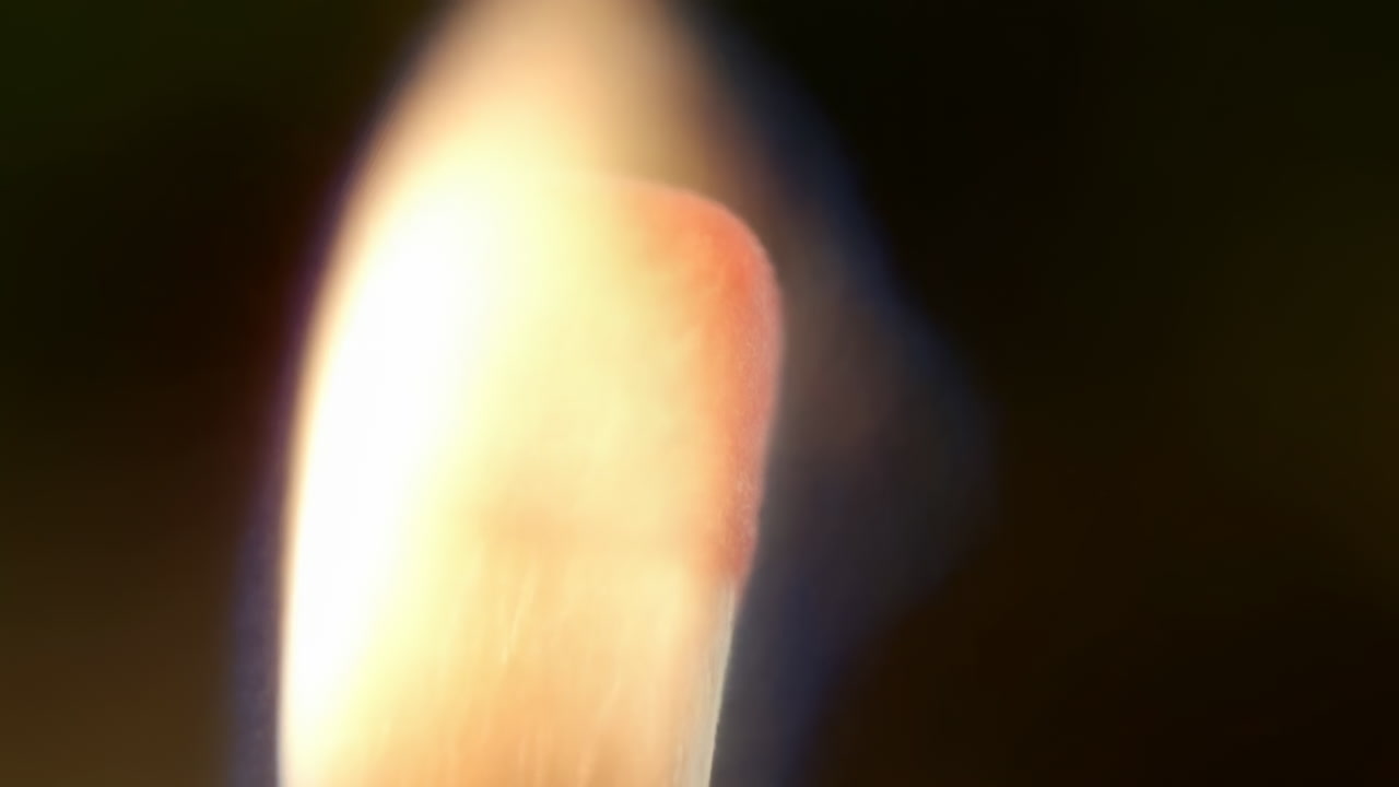 Closeup Red Match Head Igniting Flame, Macro Sequence Showing Spark And Flame Burst, Textured Phosphorus Tip