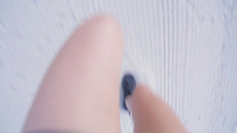 pov of a young woman running in the beach