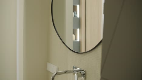 modern bathroom vanity with round mirror