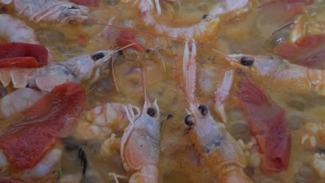 Close-up-paella-rice-slow-cooking