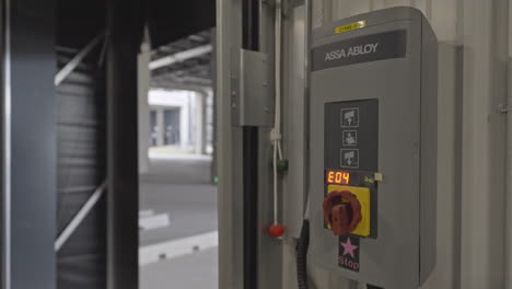 control panel for loading dock bay doors in warehouse