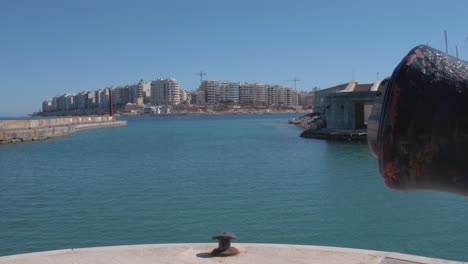 Cannon-muzzle-as-the-foreground-with-the-buildings-in-Tower-Road-as-background-in-Malta