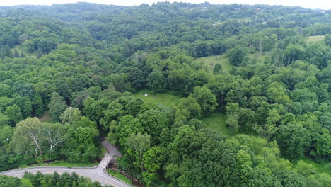 a slow rising aerial establishing shot of the allegheny mountains and valley