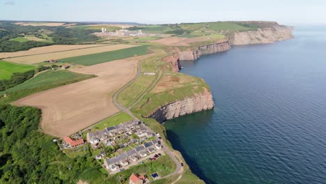 aerial drone wide-angle footage of cowbar village in north yorkshire in summer