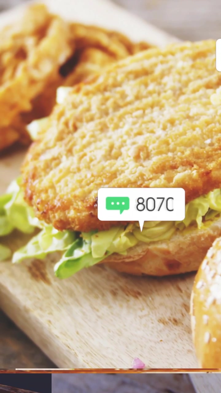 Vertical video: Bell dinging starting chicken sandwich reveal, icons rising, counts showing buzz