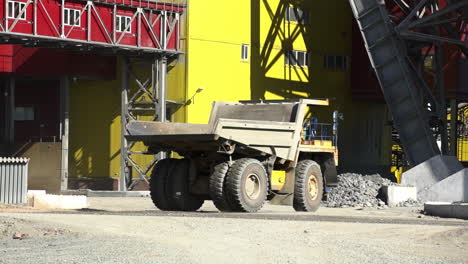 industrial dump truck at a mining or processing facility