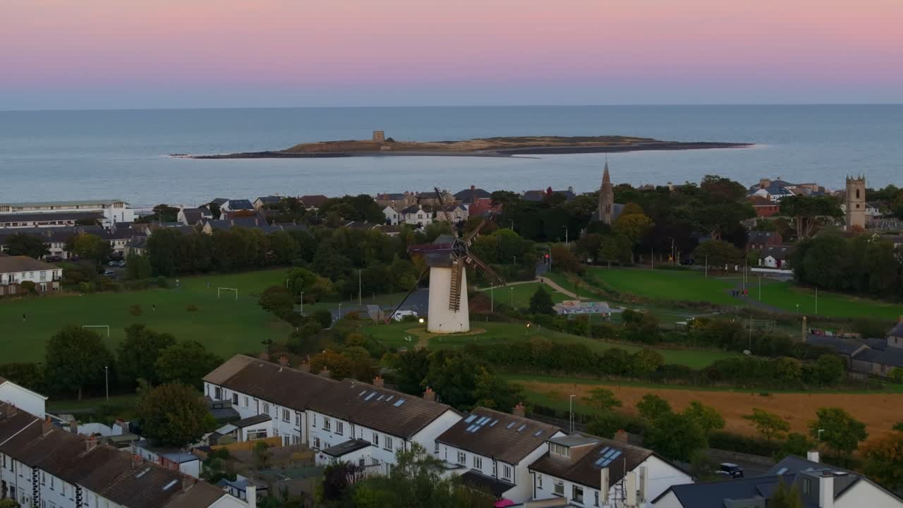 4K High-resolution drone shot of the historic Skerries windmills, at the sunset Co.Dublin, Ireland_04