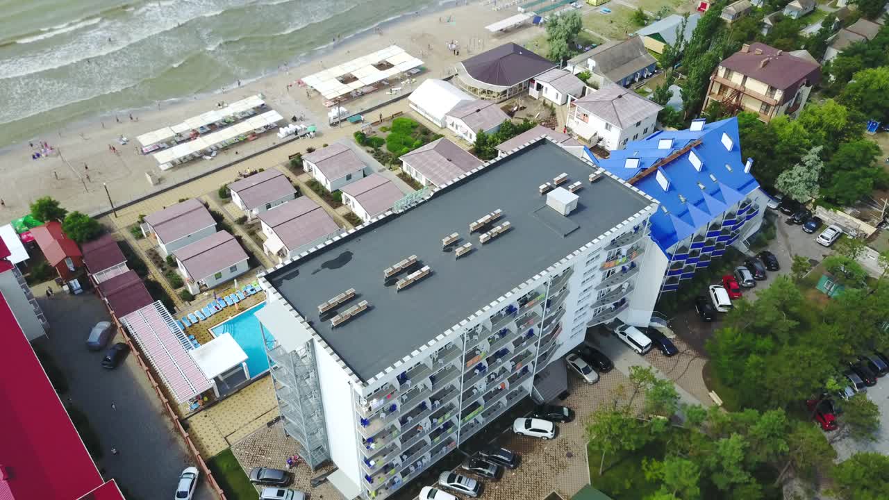Odessa, Ukraine - August 2017: Aerial view on luxury hotel with pool near the sea beach