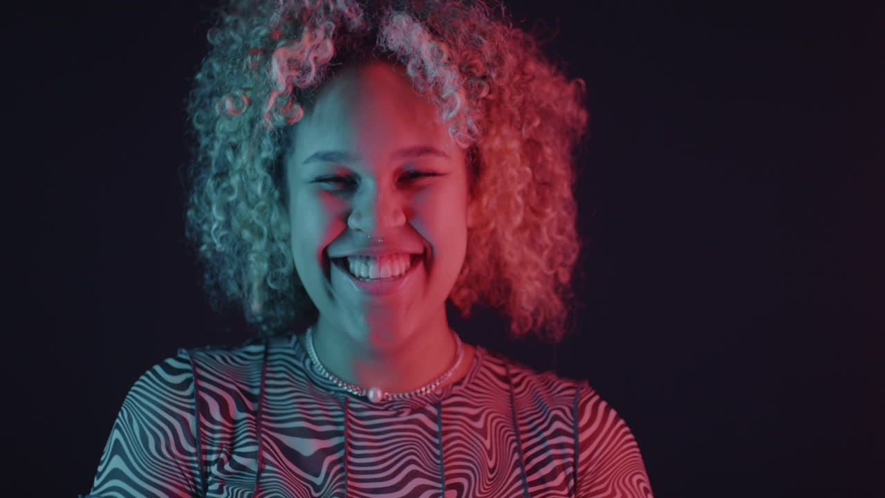 Joyful Woman Portrait in Neon Light