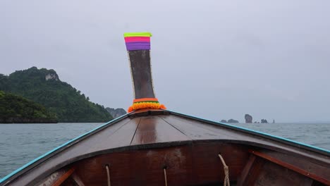 longtail boat navigating scenic krabi coastline