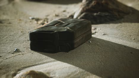 old rusty fuel canister in the desert