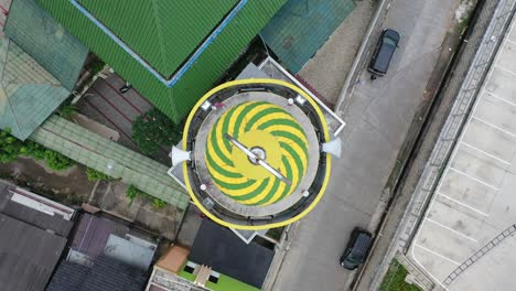 aerial view of building with spiral roof