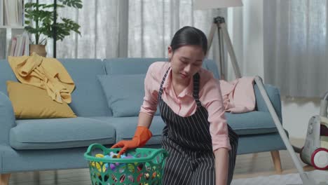 woman cleaning a living room