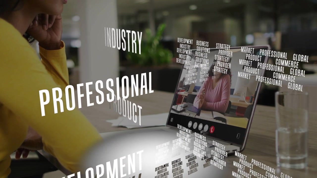 Woman watching laptop as colleague speaking, 3D commerce words streaming right highlighting topics