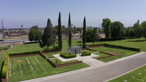 low aerial dolly shot of a veteran's memorial at a mortuary in california