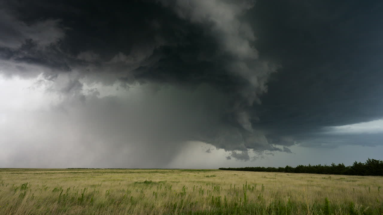 Massive Thunderstorm Over a Field