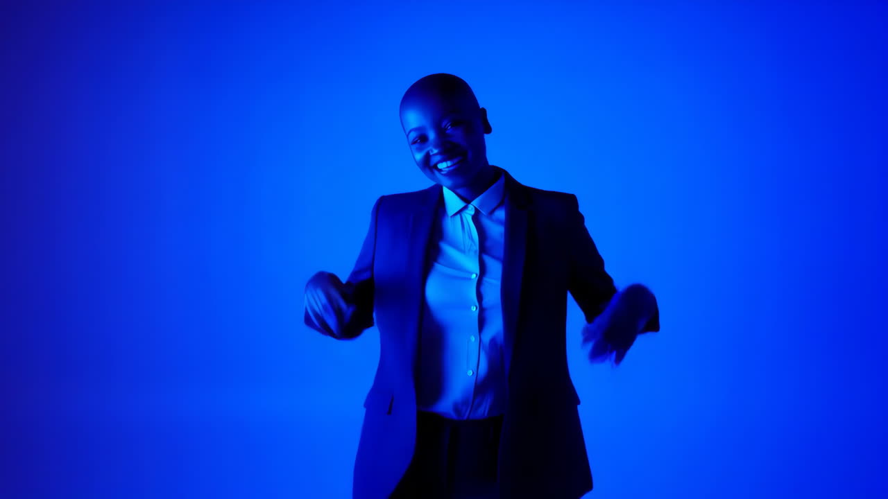 Stylish Woman Smiling and Posing in Vibrant Blue Neon Light