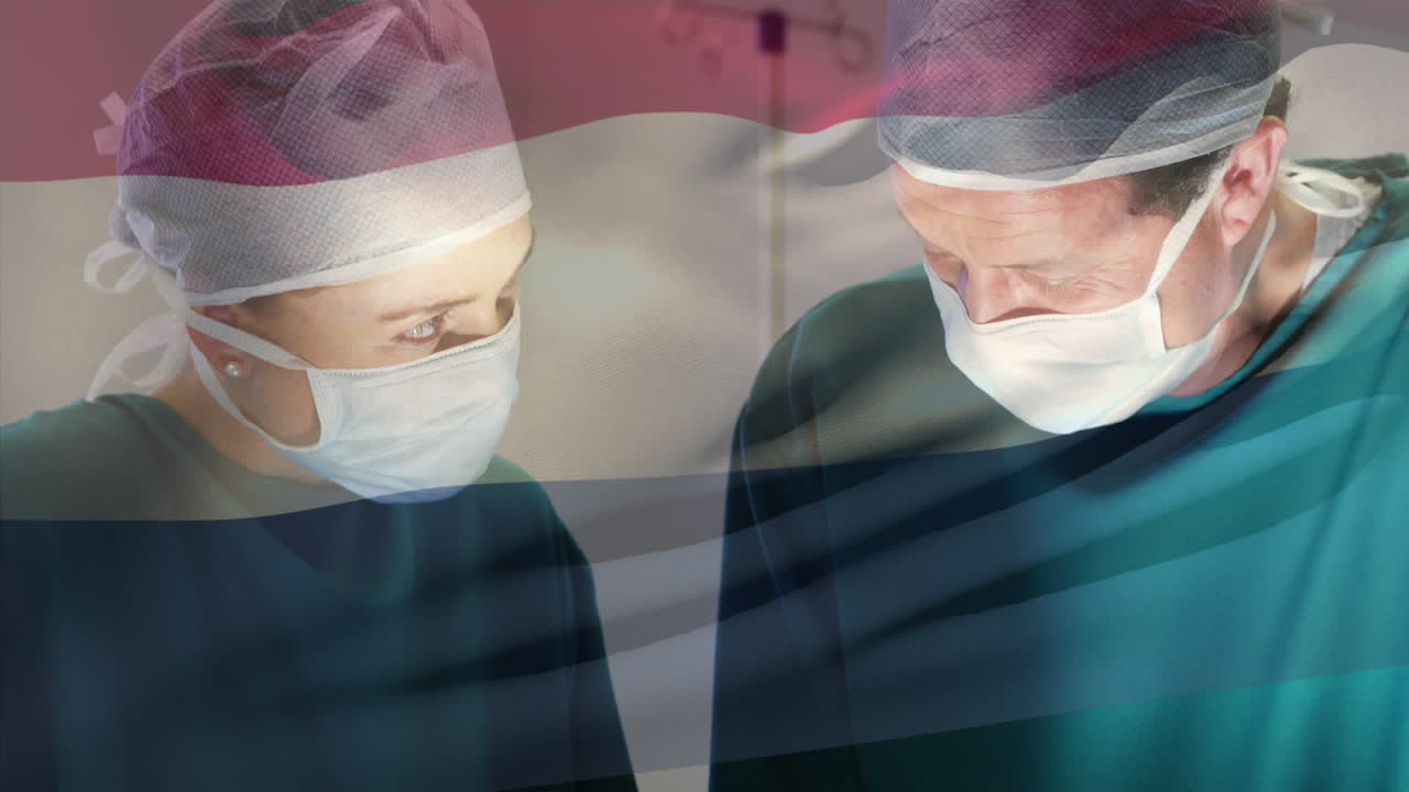 수술실에서 외과 의사 들 위 에 흔들리는 네덜란드 의  ⁇ 발 의 애니메이션