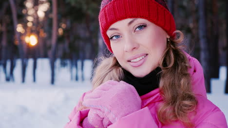 portrait of a young attractive caucasian woman in a winter forest 1