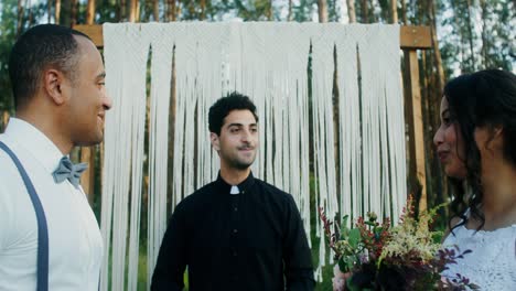 outdoor wedding ceremony in the forest