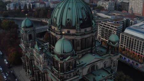 Cropped-view-of-Berlin-Cathedral-in-dusk-light.-Elevating-footage-richly-decorated-historical-landmark.-Berlin,-Germany.