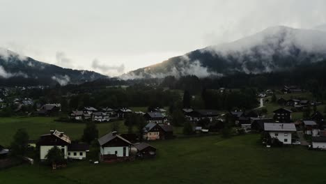 alpine village in fog